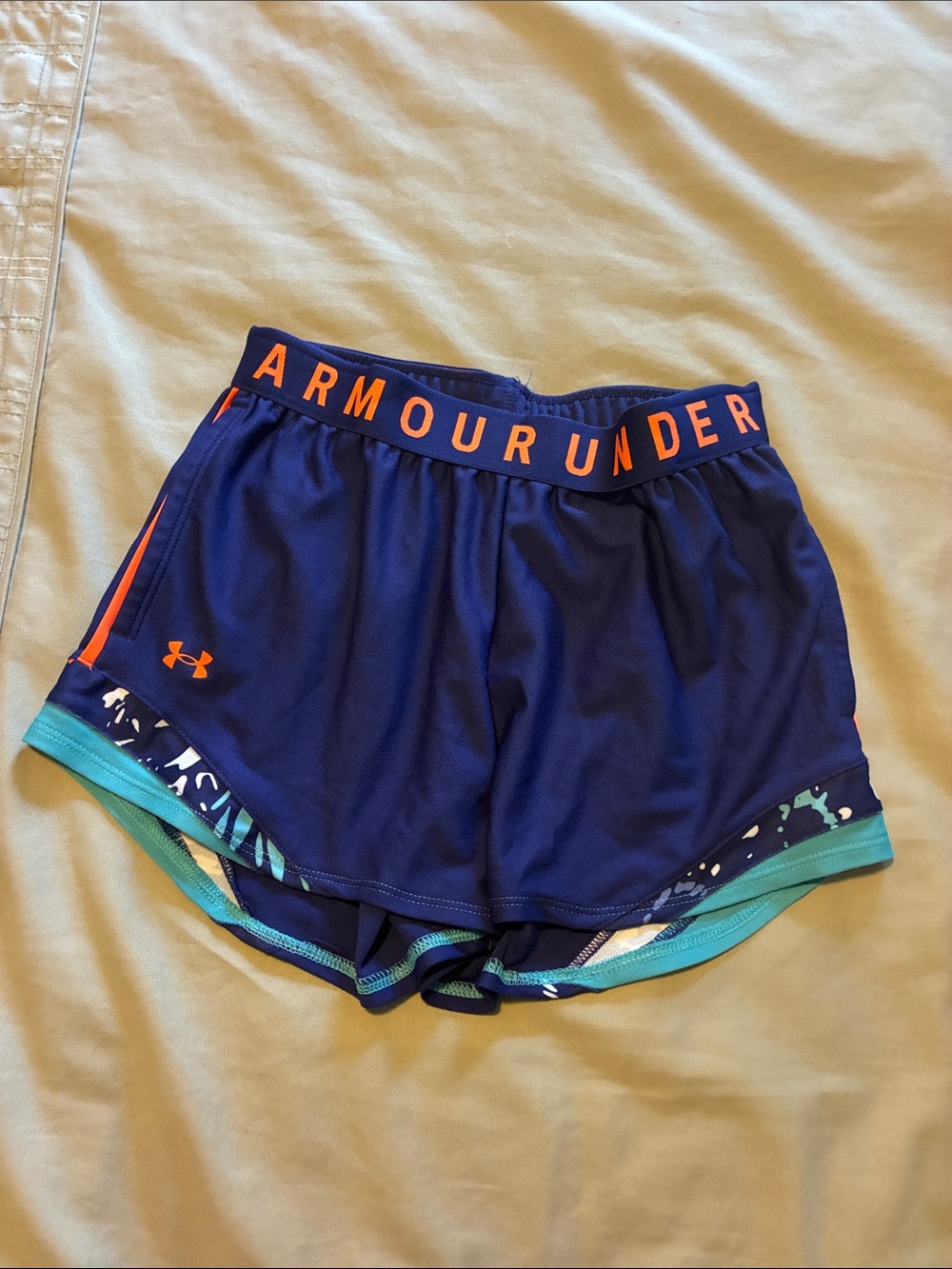 Under Armour Women’s Royal Blue Athletic Shorts with Orange Trim